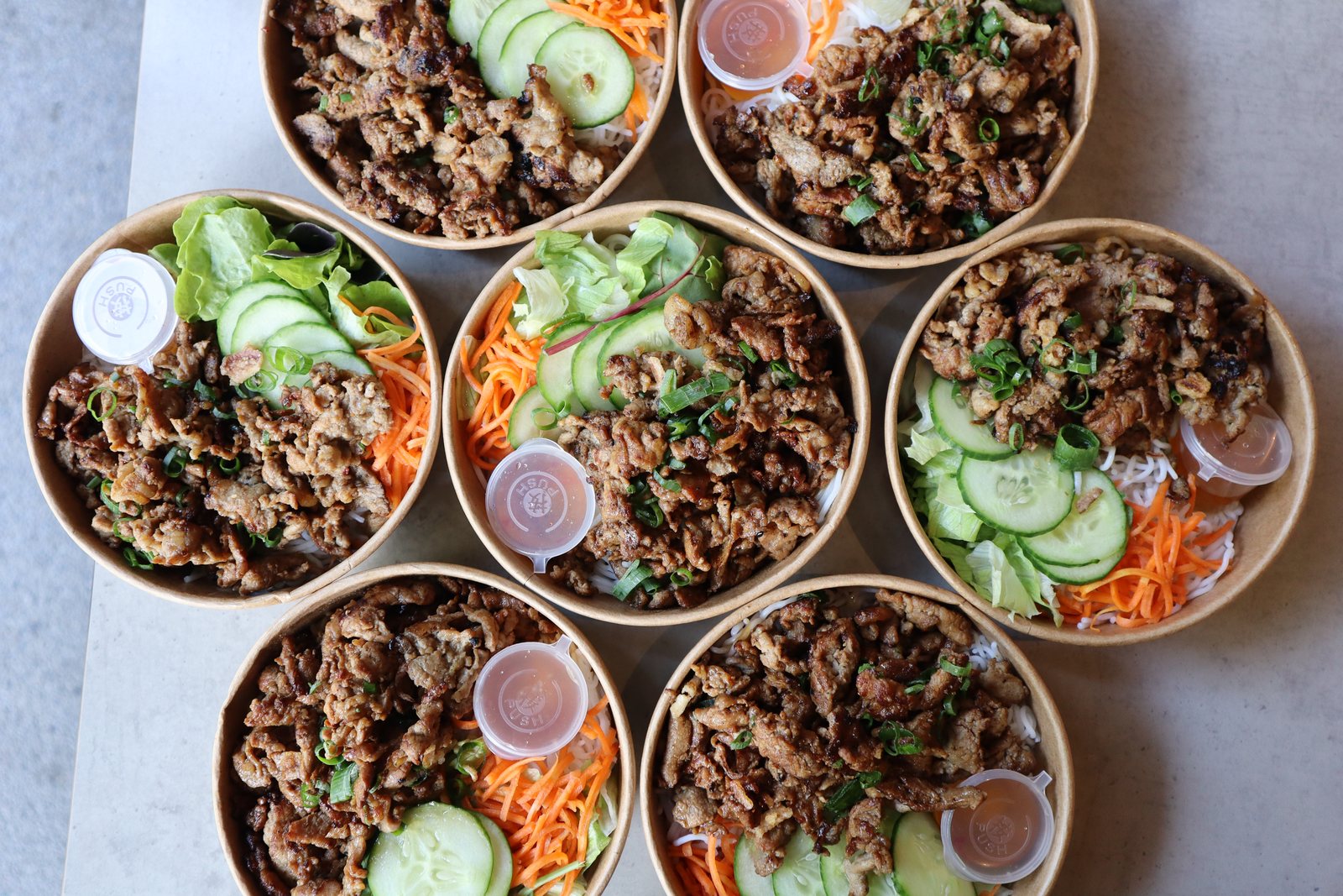 Fresh Asian vermicelli bowls with grilled meat, cucumber, carrot and herbs — Rice Pantry corporate catering