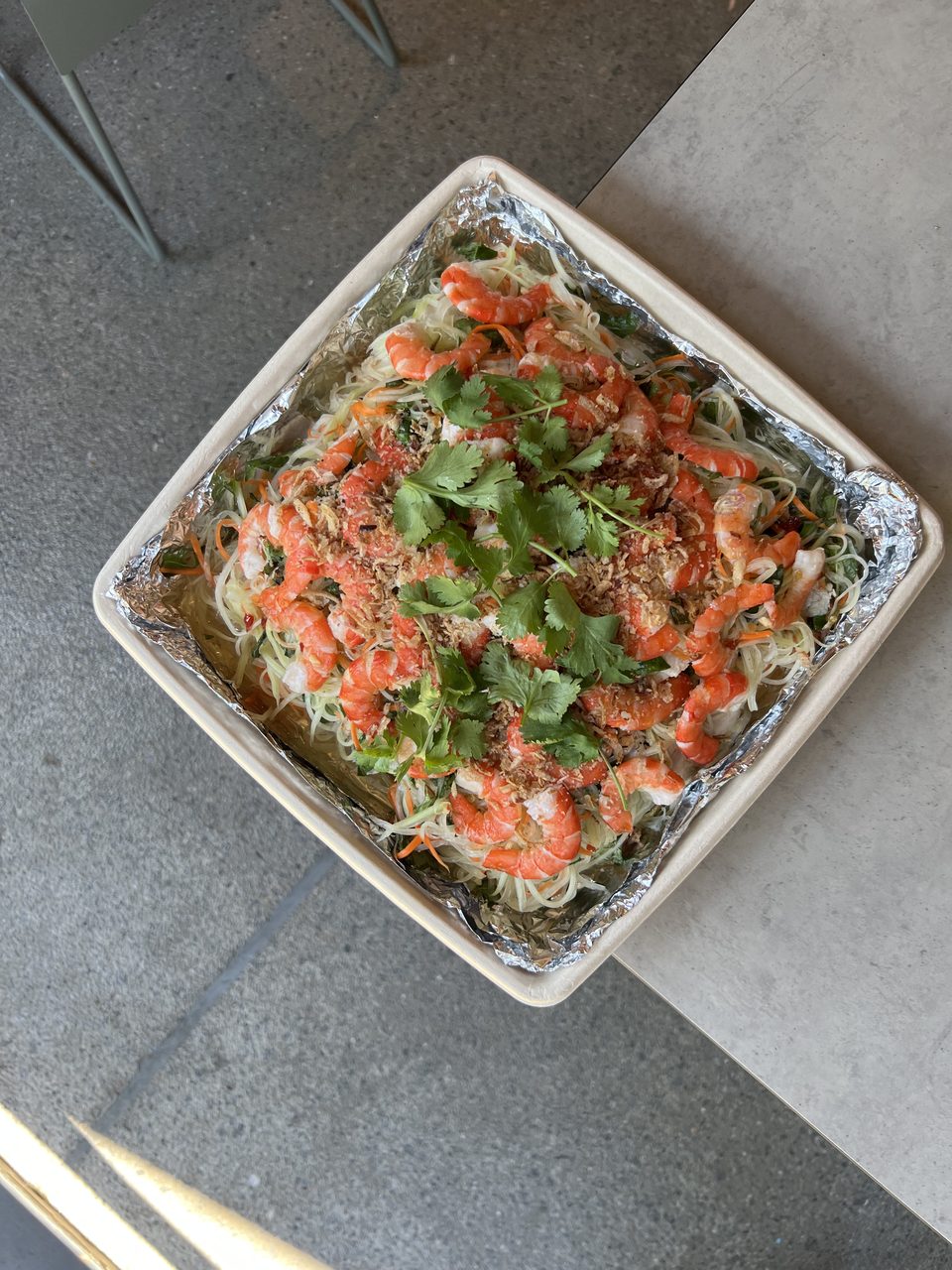 Vibrant green papaya and prawn salad